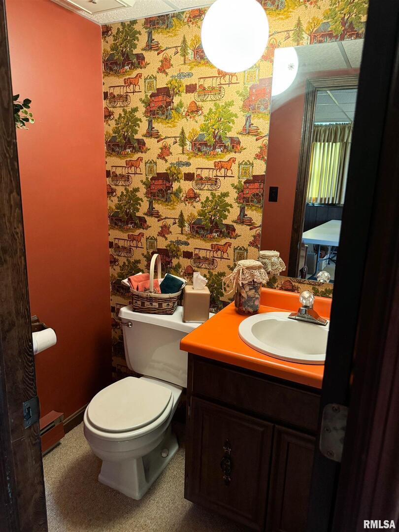 2885 State Route 146 Anna, IL 62906 - Photo 45 of 46 a bathroom with a toilet sink and mirror