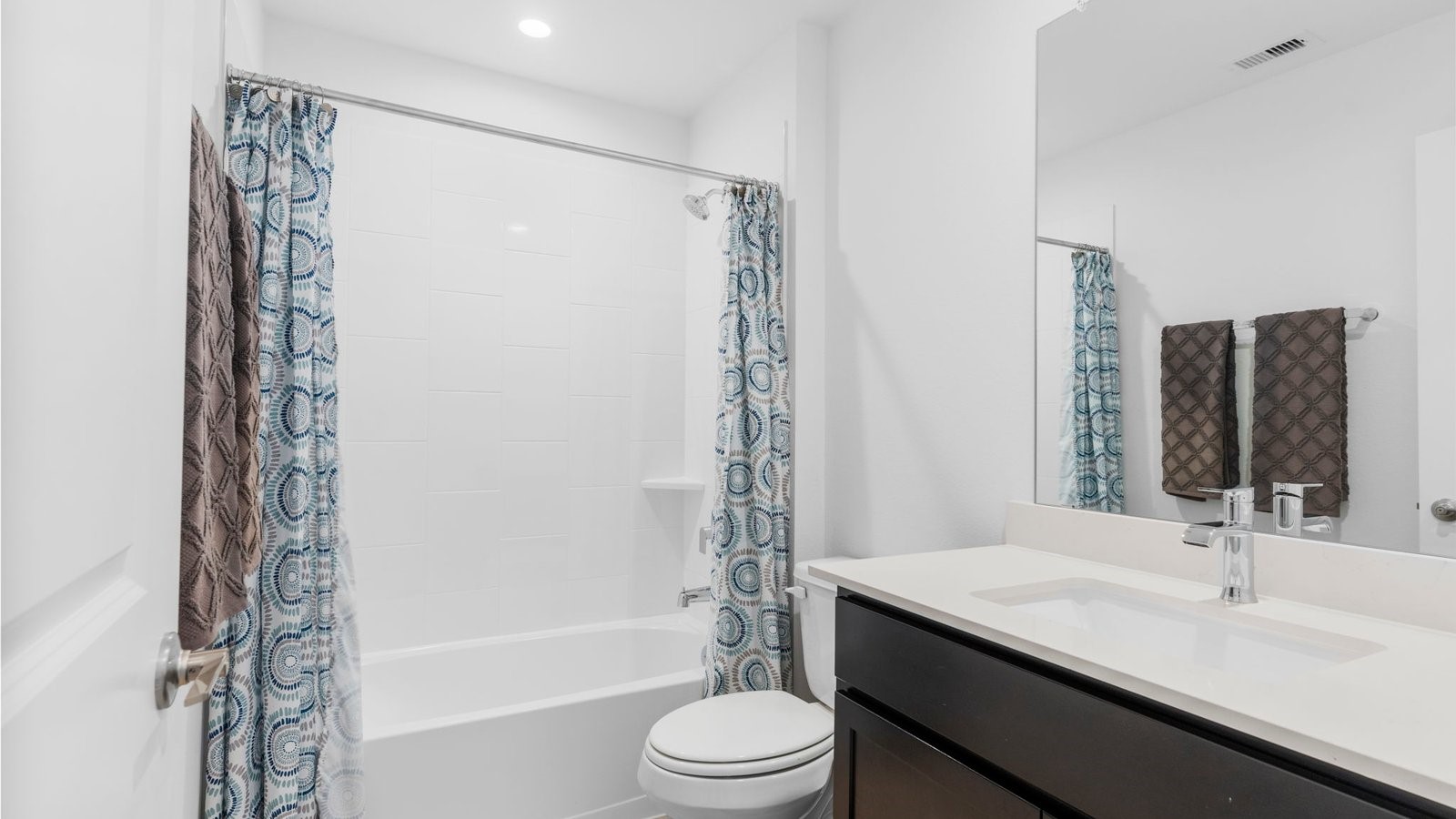 31319 Verona Ridge Drive Fulshear, TX 77441 - Photo 13 of 39 a bathroom with a sink a toilet and shower