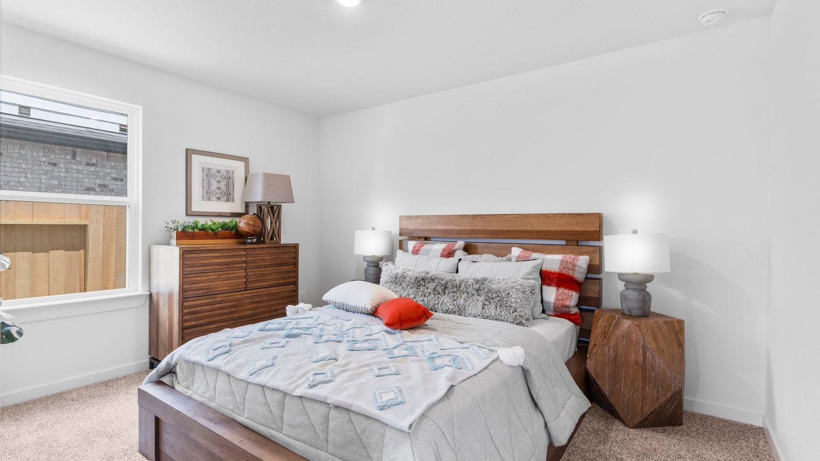 31319 Verona Ridge Drive Fulshear, TX 77441 - Photo 16 of 39 a bedroom with a bed and wooden floor