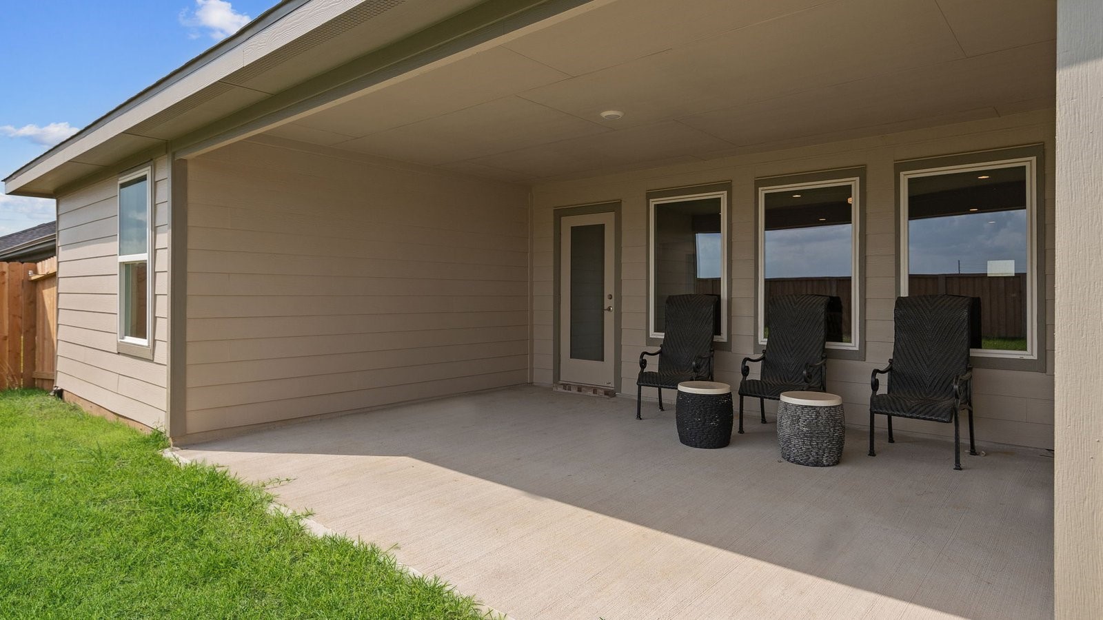31319 Verona Ridge Drive Fulshear, TX 77441 - Photo 24 of 39 a view of a patio with chairs and potted plants