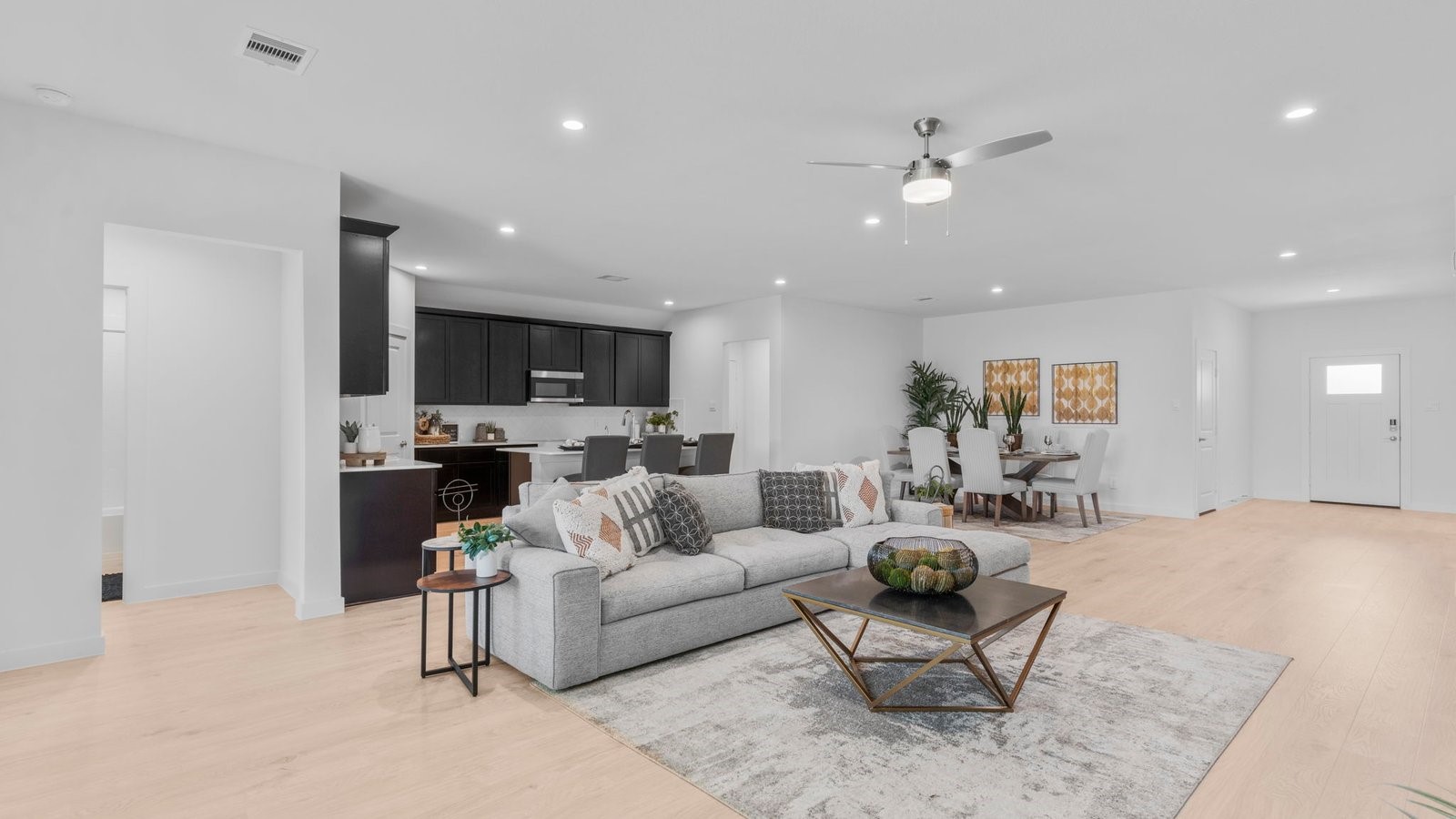 31319 Verona Ridge Drive Fulshear, TX 77441 - Photo 4 of 39 a living room with furniture and kitchen view