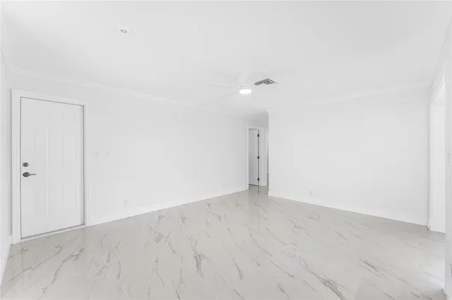 a kitchen with sink and window