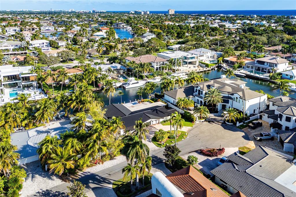 2443 Northeast 26th Street Lighthouse Point, FL 33064 - Photo 58 of 67 an aerial view of residential houses with outdoor space