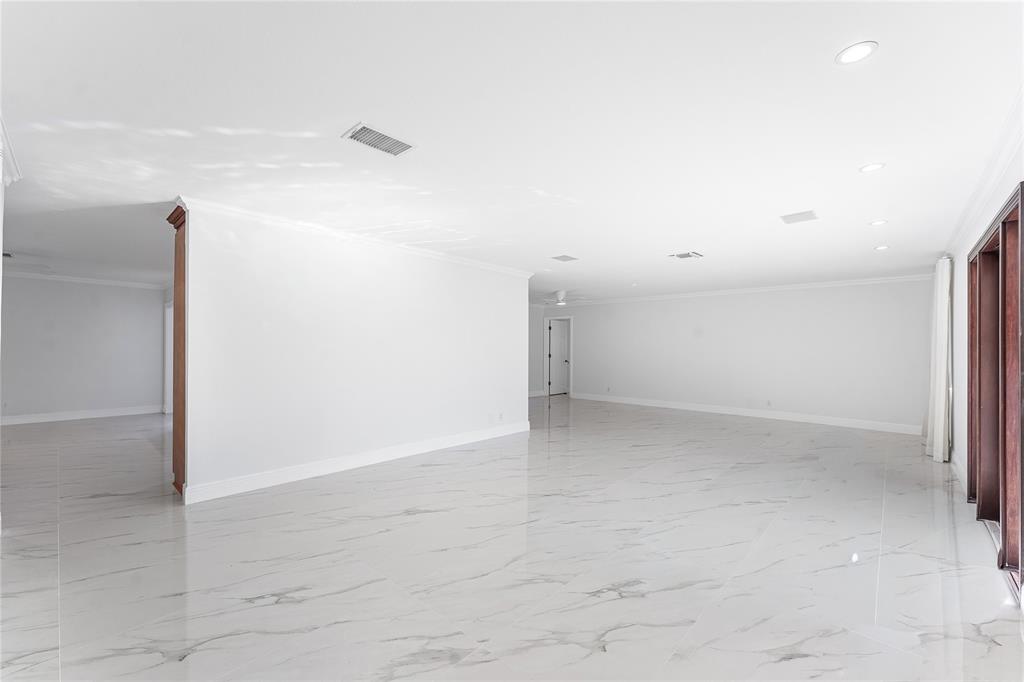 2443 Northeast 26th Street Lighthouse Point, FL 33064 - Photo 8 of 67 a view of an empty room