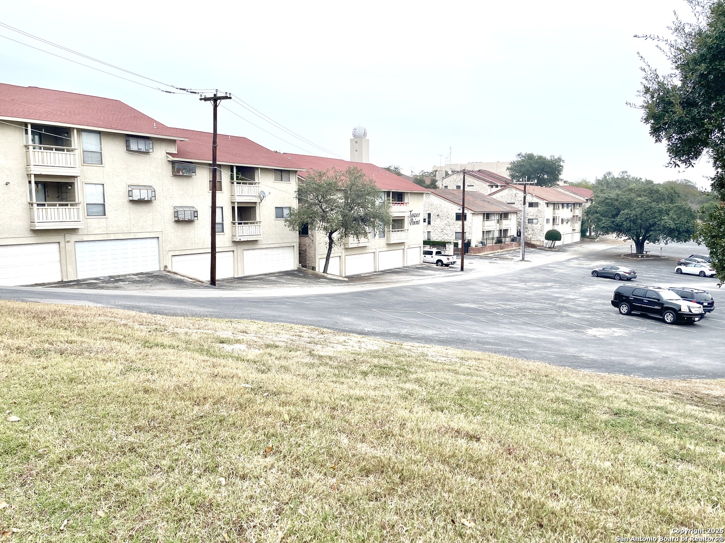 7738 Chambers Road, Unit 403 San Antonio, TX 78229 - Photo 37 of 37 a front view of a house with a yard