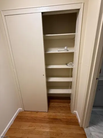 a view of an empty walk in closet
