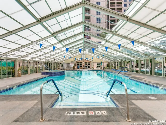 a view of a patio with a yard