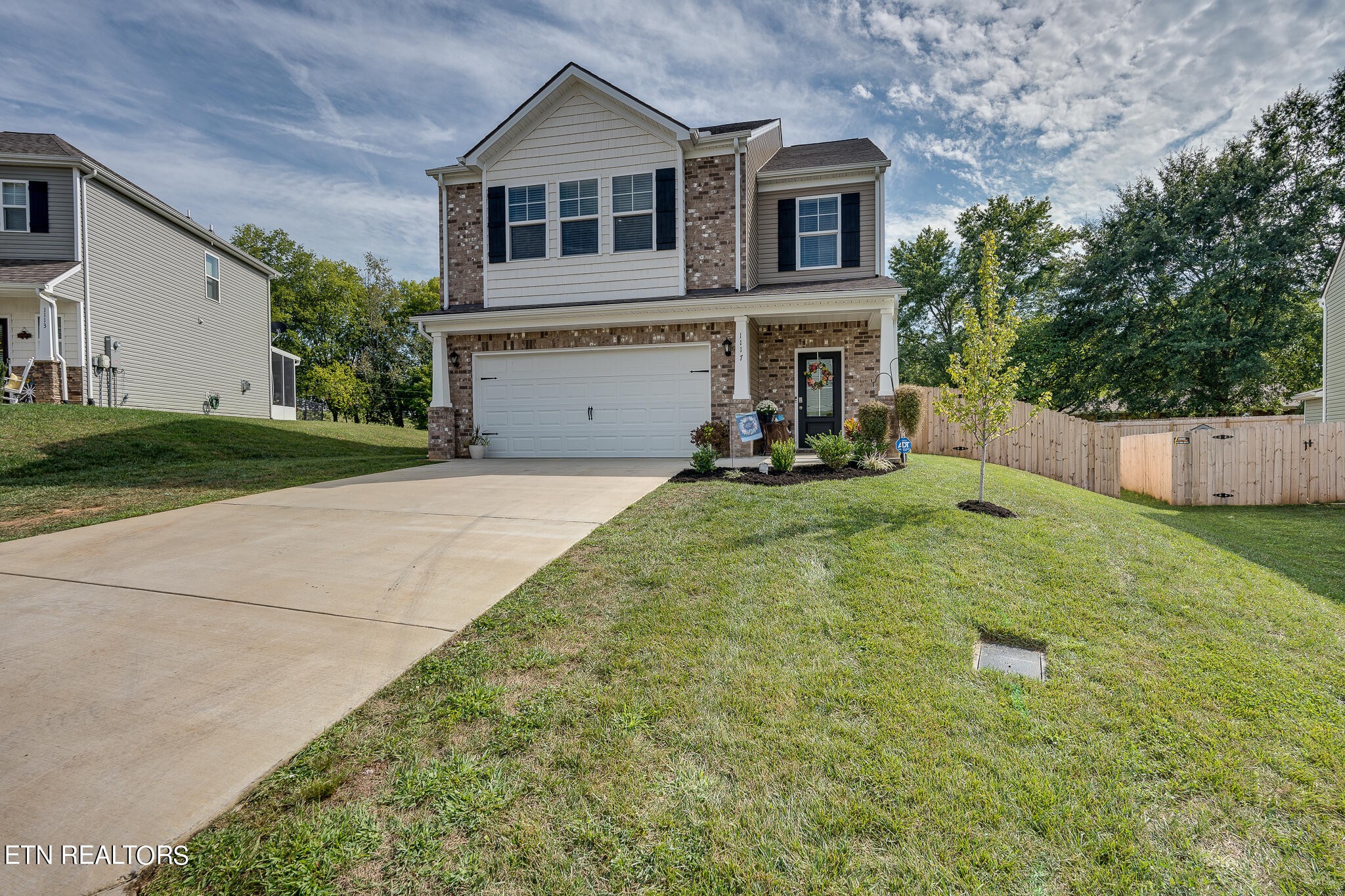 1117 Beacon Road Sevierville, TN 37876 - Photo 2 of 55 a view of a house with a yard and sitting area