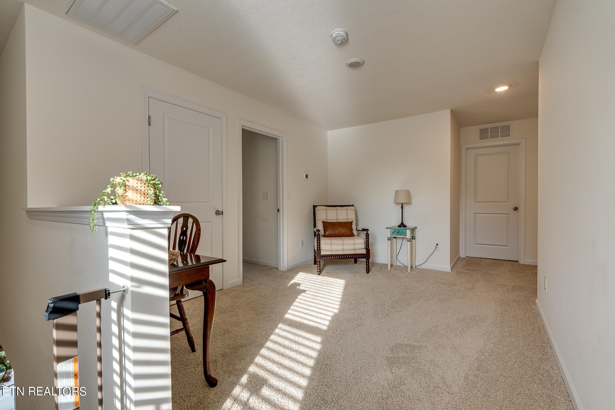 1117 Beacon Road Sevierville, TN 37876 - Photo 27 of 55 a view of a bedroom with furniture and staircase