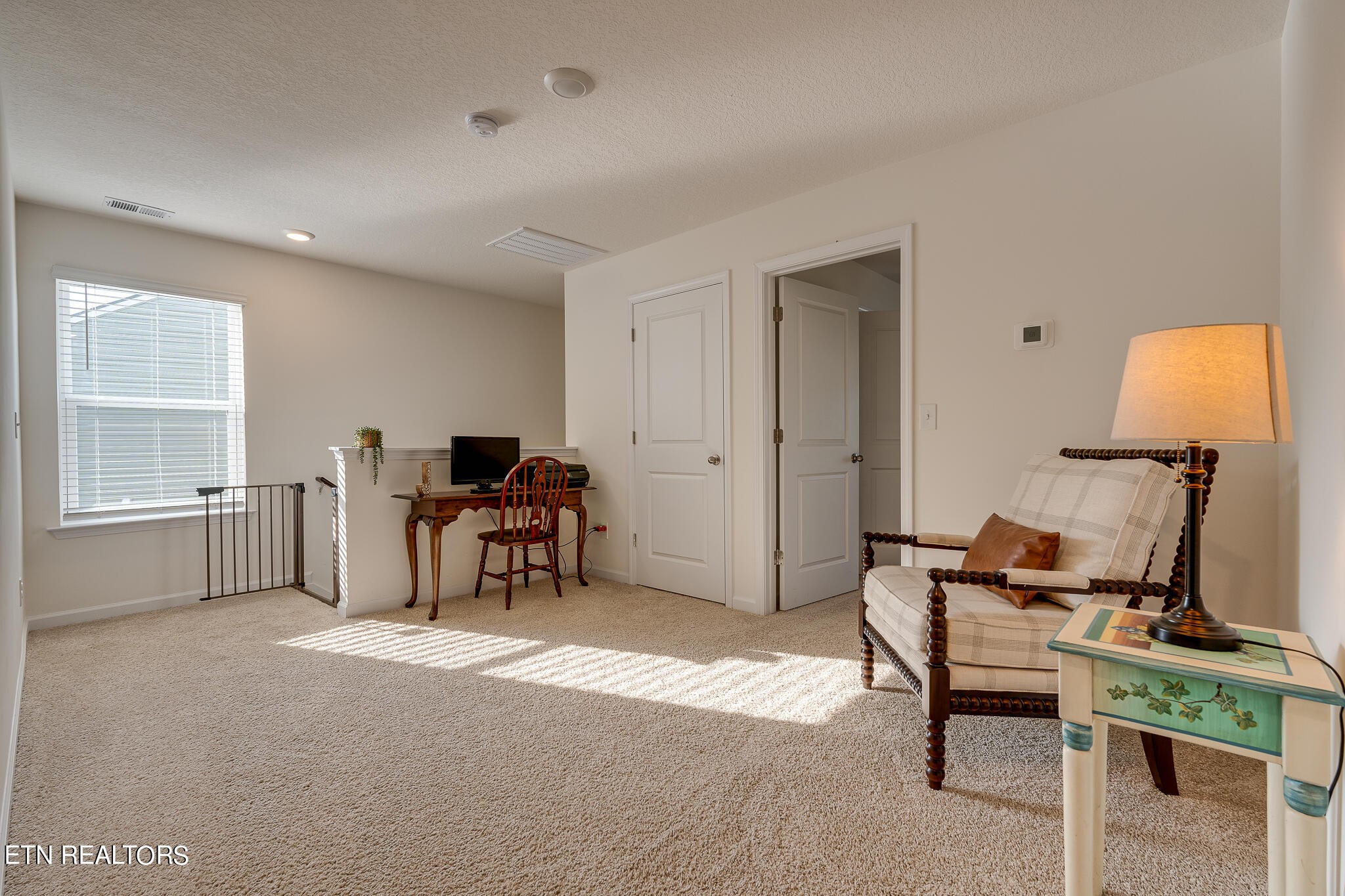 1117 Beacon Road Sevierville, TN 37876 - Photo 28 of 55 a work room with furniture and a window