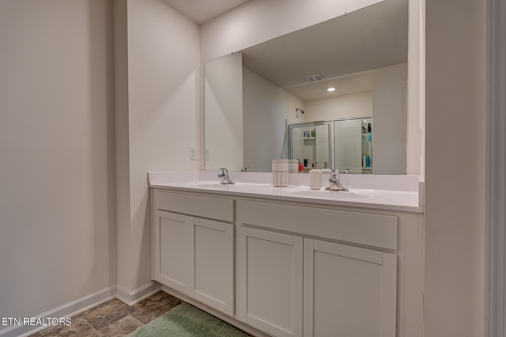 1117 Beacon Road Sevierville, TN 37876 - Photo 33 of 55 a bathroom with a sink and a mirror