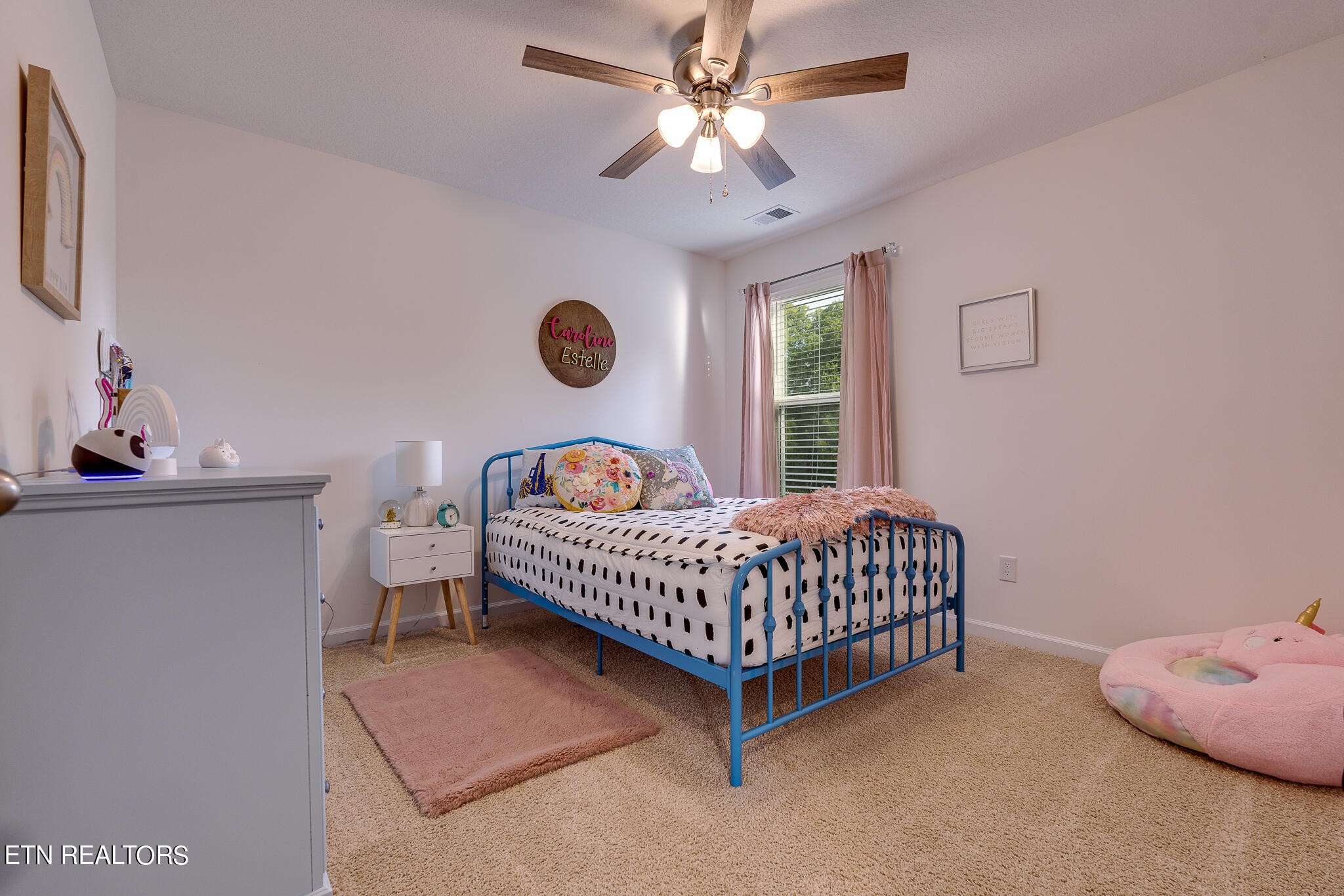 1117 Beacon Road Sevierville, TN 37876 - Photo 35 of 55 a bedroom with a bed and window