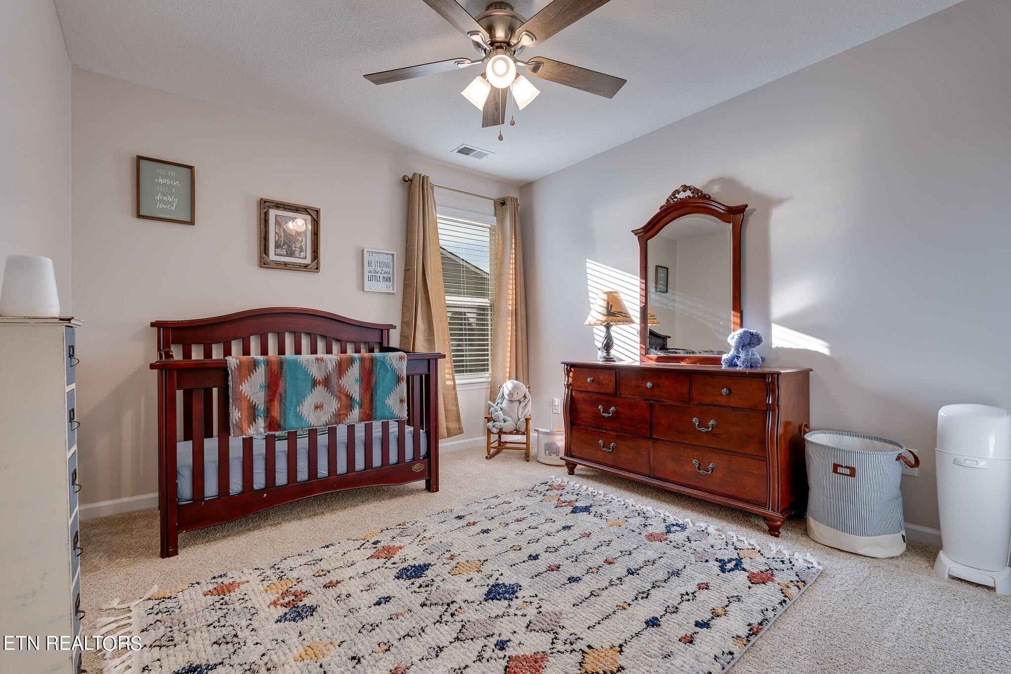 1117 Beacon Road Sevierville, TN 37876 - Photo 37 of 55 a bedroom with a bed and a dresser