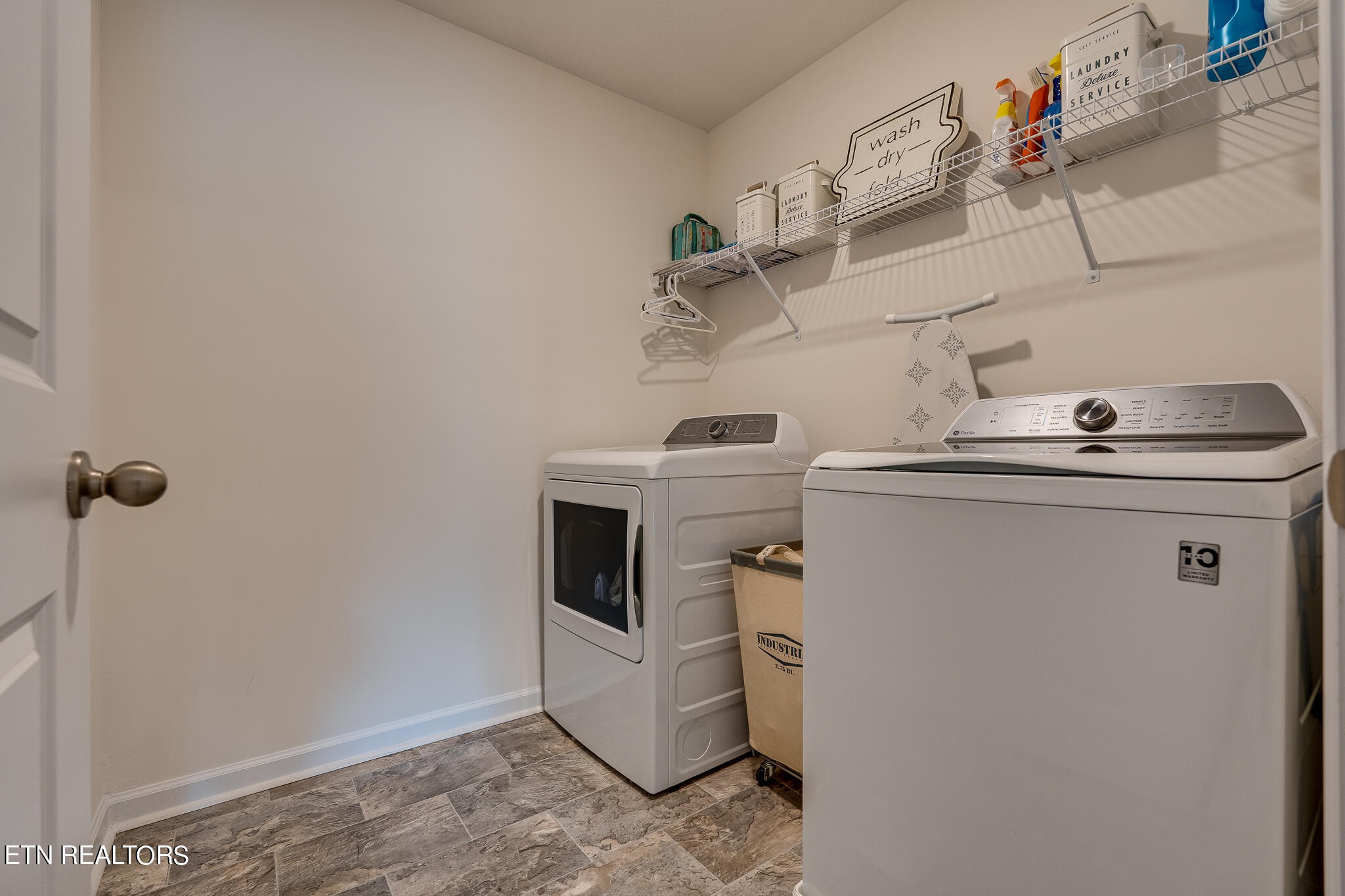 1117 Beacon Road Sevierville, TN 37876 - Photo 40 of 55 a utility room with dryer and washer