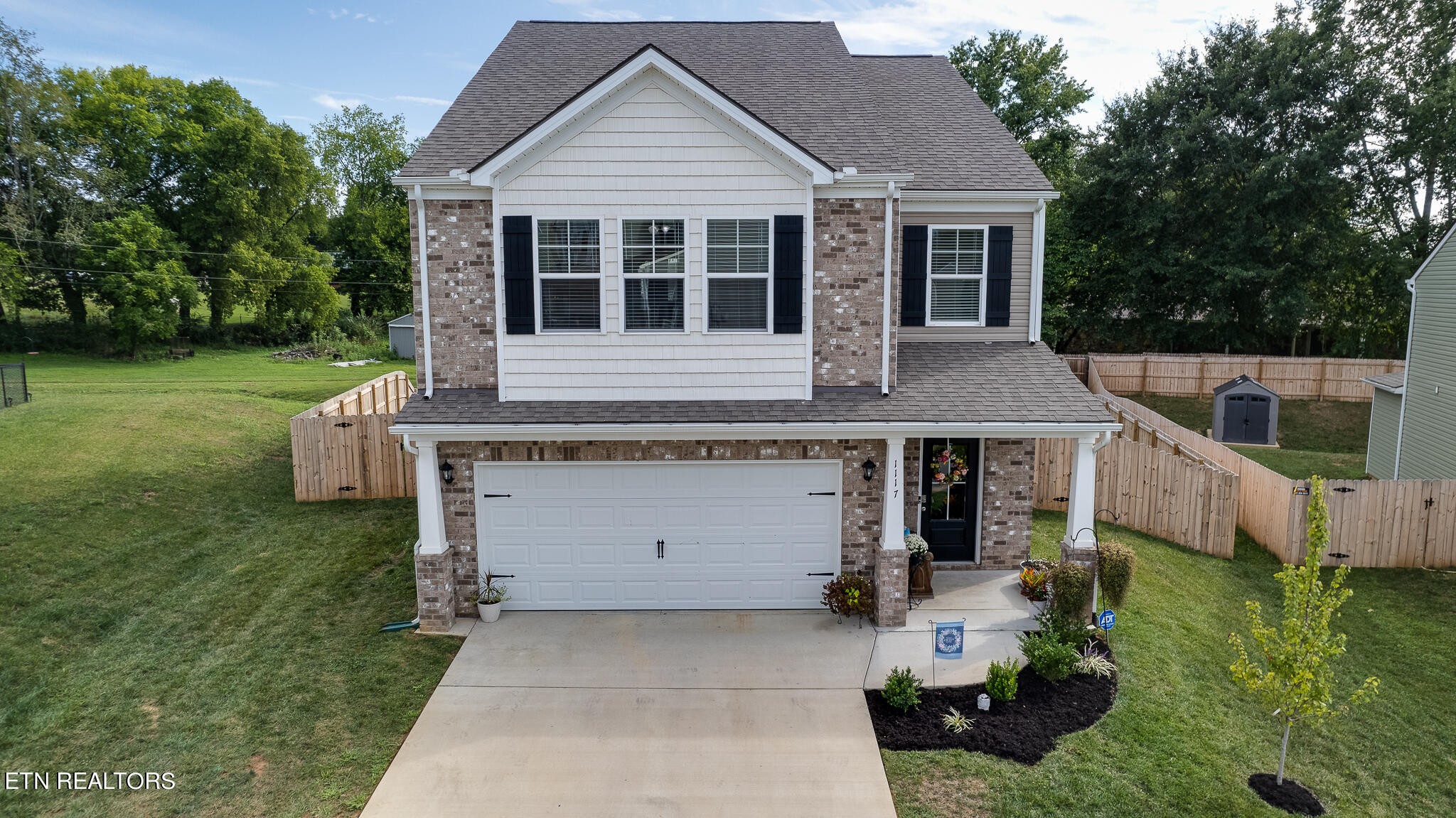 1117 Beacon Road Sevierville, TN 37876 - Photo 51 of 55 front view of a house with a yard