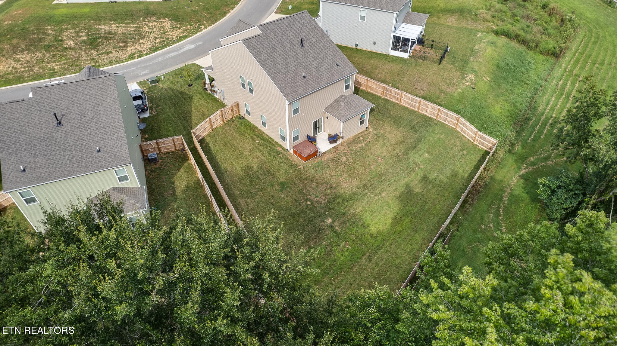 1117 Beacon Road Sevierville, TN 37876 - Photo 53 of 55 an aerial view of residential houses with outdoor space and trees