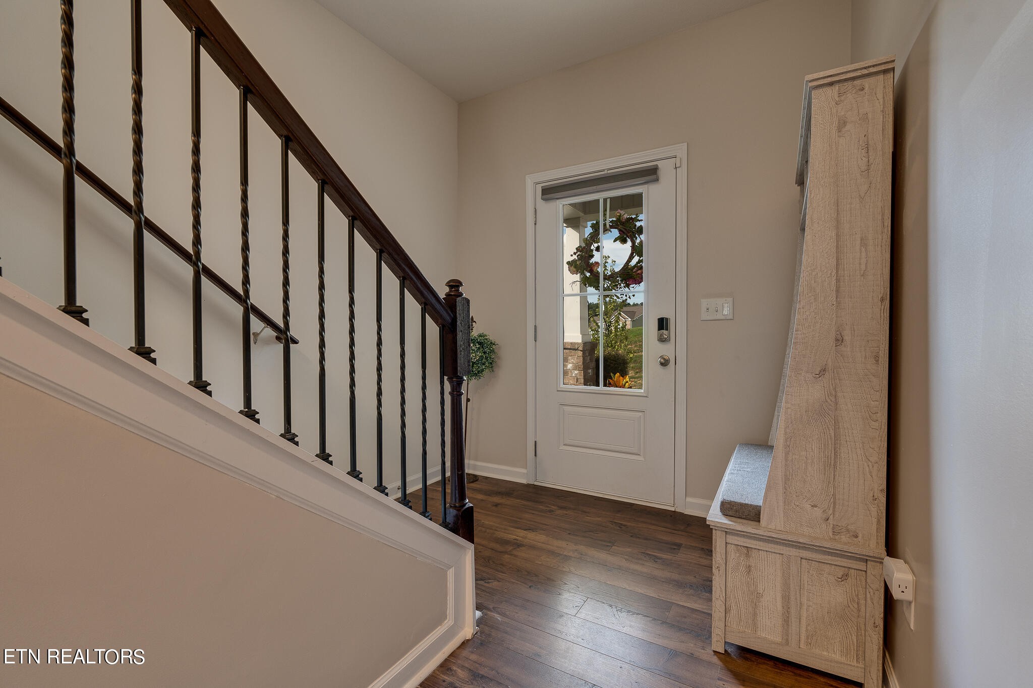 1117 Beacon Road Sevierville, TN 37876 - Photo 6 of 55 a view of entryway with wooden floor and stairs
