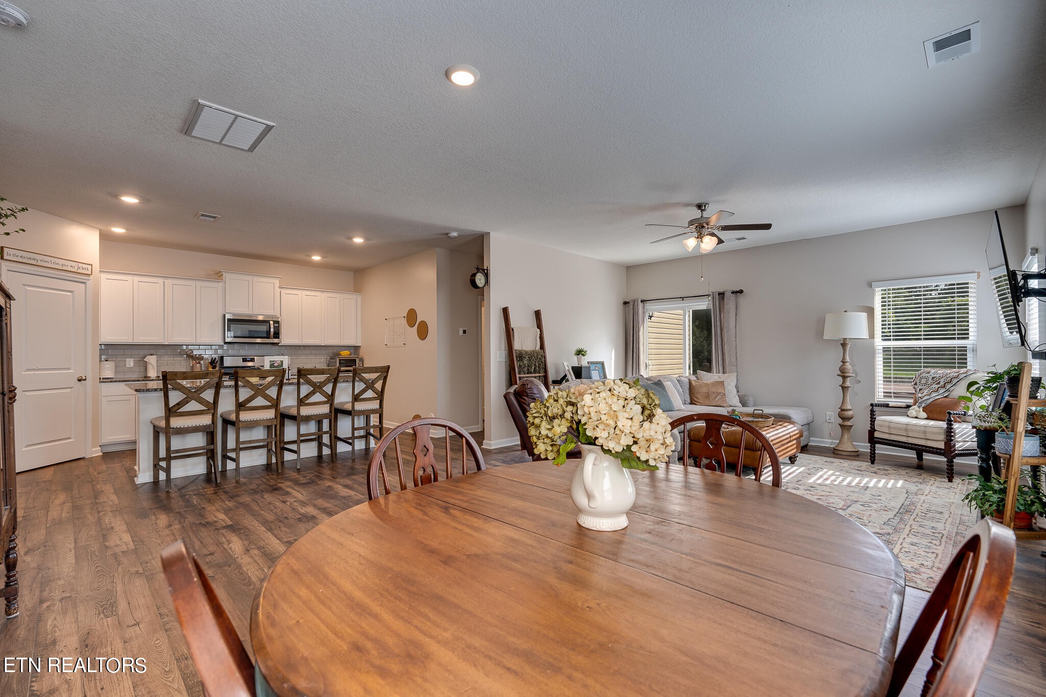 1117 Beacon Road Sevierville, TN 37876 - Photo 7 of 55 a view of a dining room with furniture and wooden floor