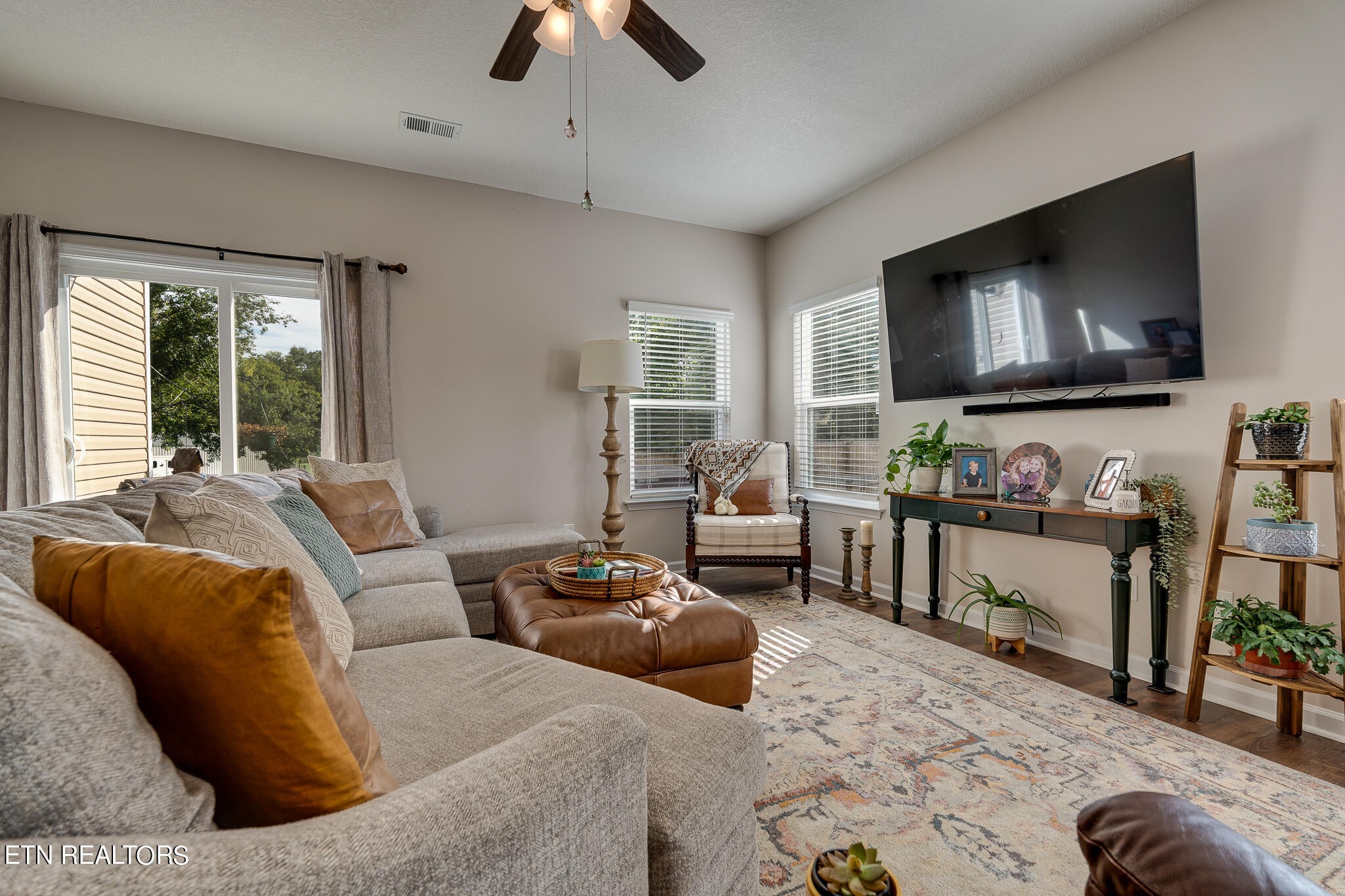 1117 Beacon Road Sevierville, TN 37876 - Photo 10 of 55 a living room with furniture and a flat screen tv