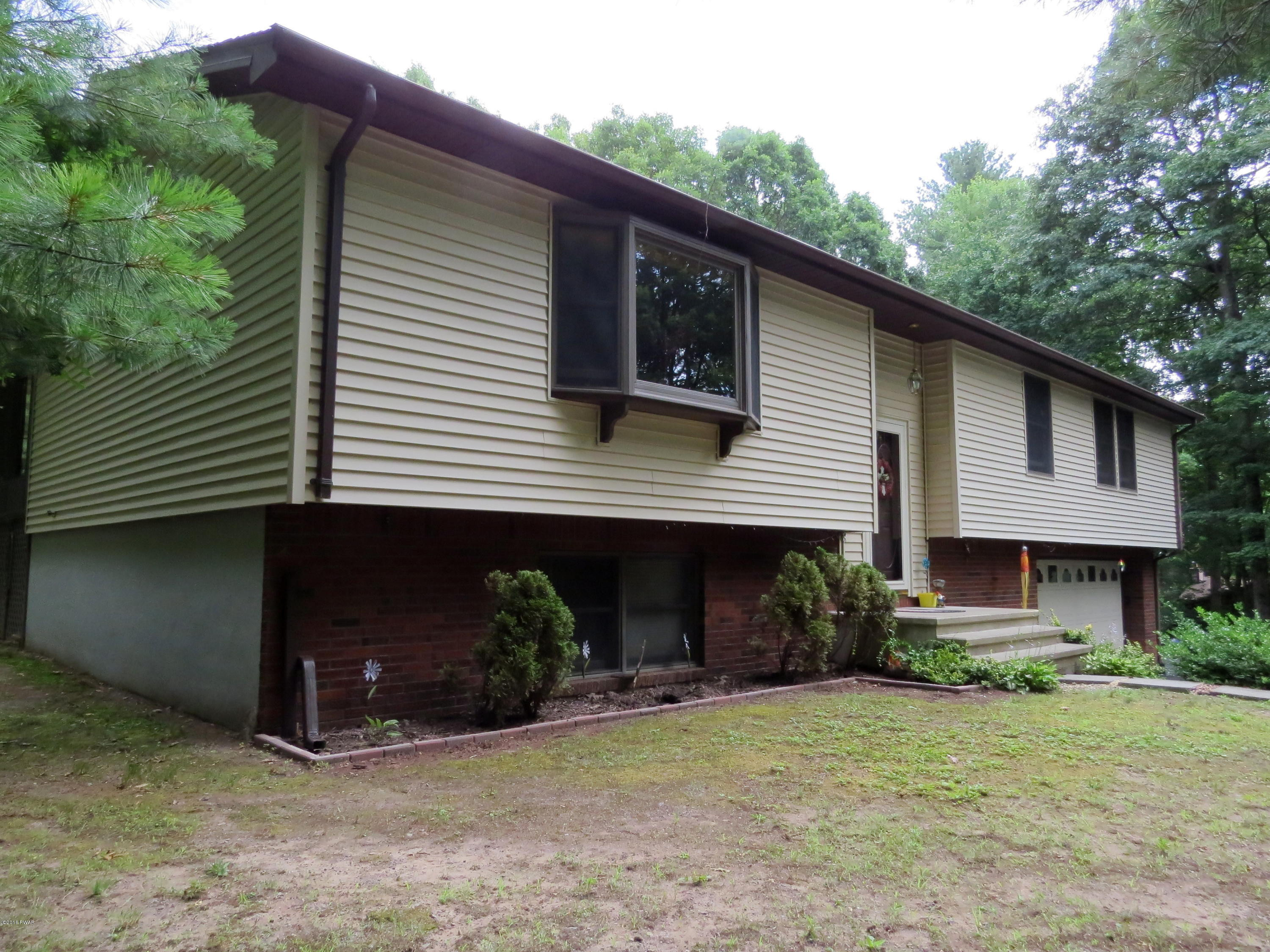 124 Pine Road Hawley, PA 18428 - Photo 40 of 46 left side of house