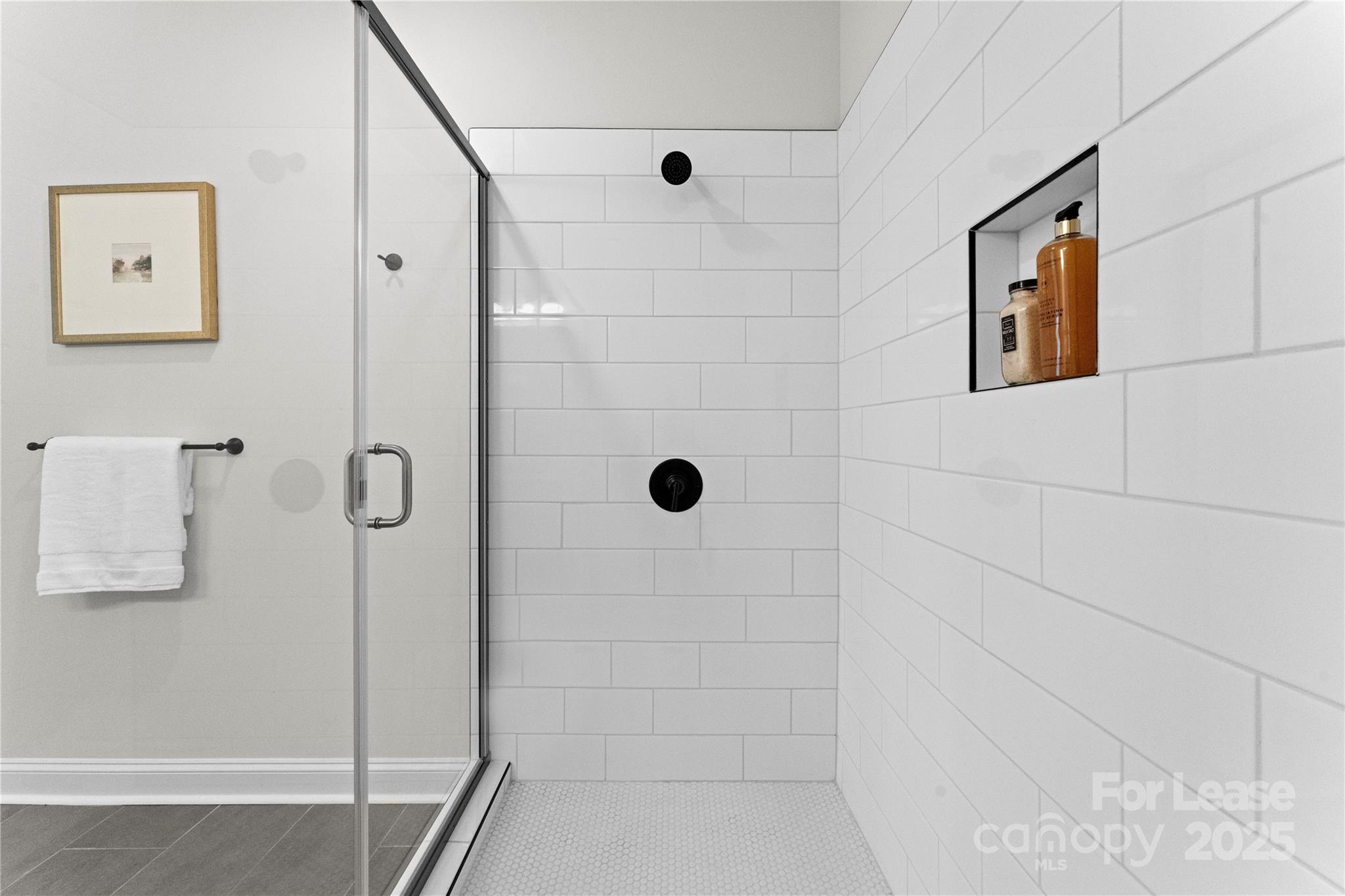 3232 Riley Avenue Charlotte, NC 28269 - Photo 14 of 19 a bathroom with a shower