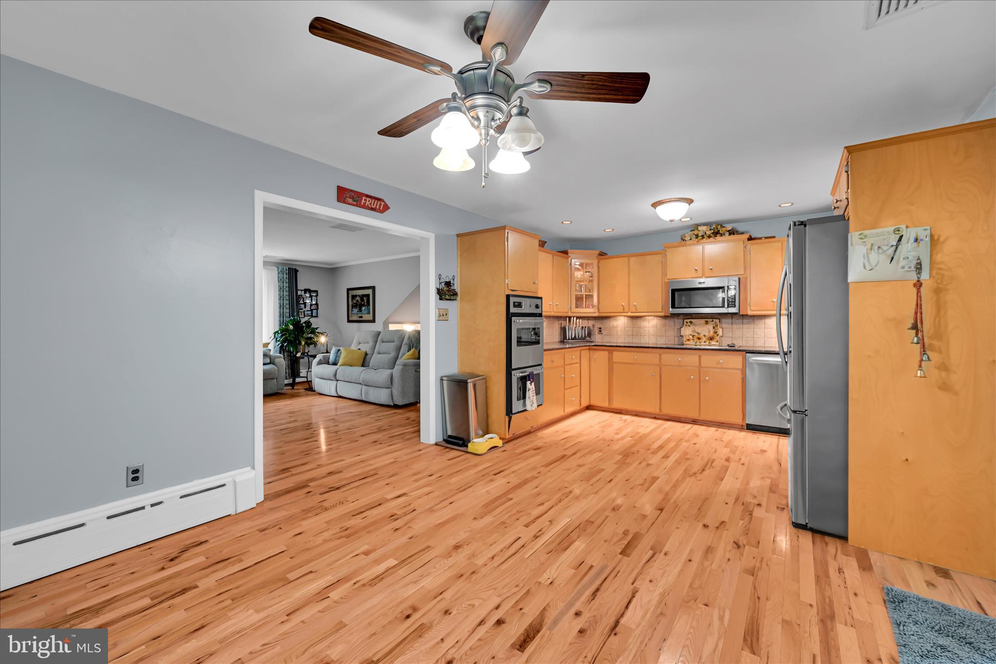 5220 Oley Turnpike Road Reading, PA 19606 - Photo 23 of 85 a view of a kitchen with wooden floor and a kitchen space
