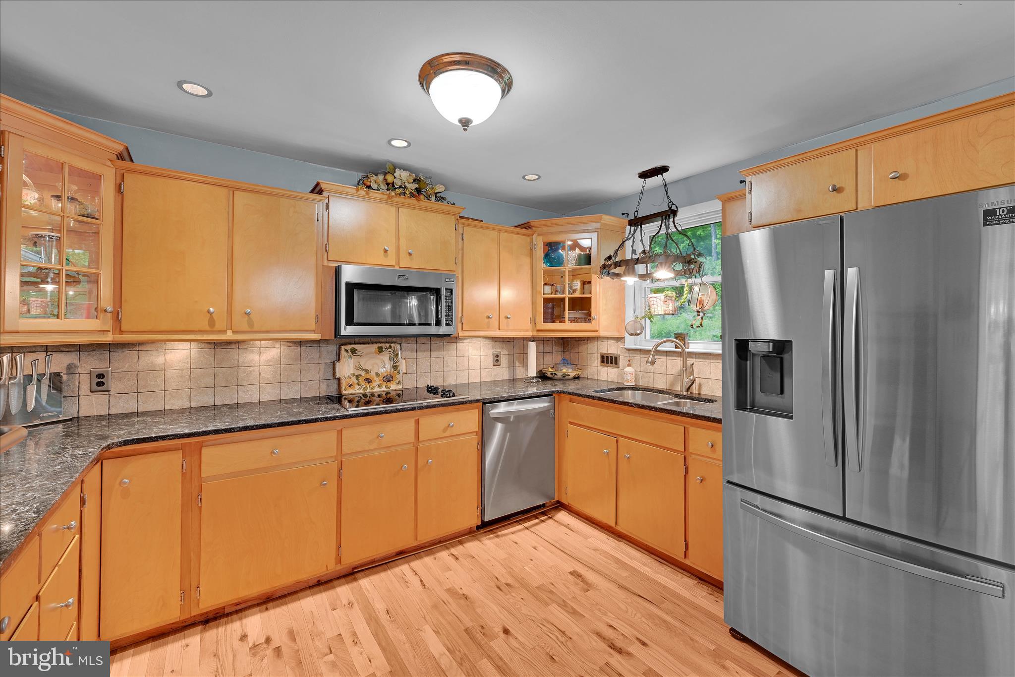 5220 Oley Turnpike Road Reading, PA 19606 - Photo 25 of 85 a kitchen with granite countertop stainless steel appliances a sink and counter space