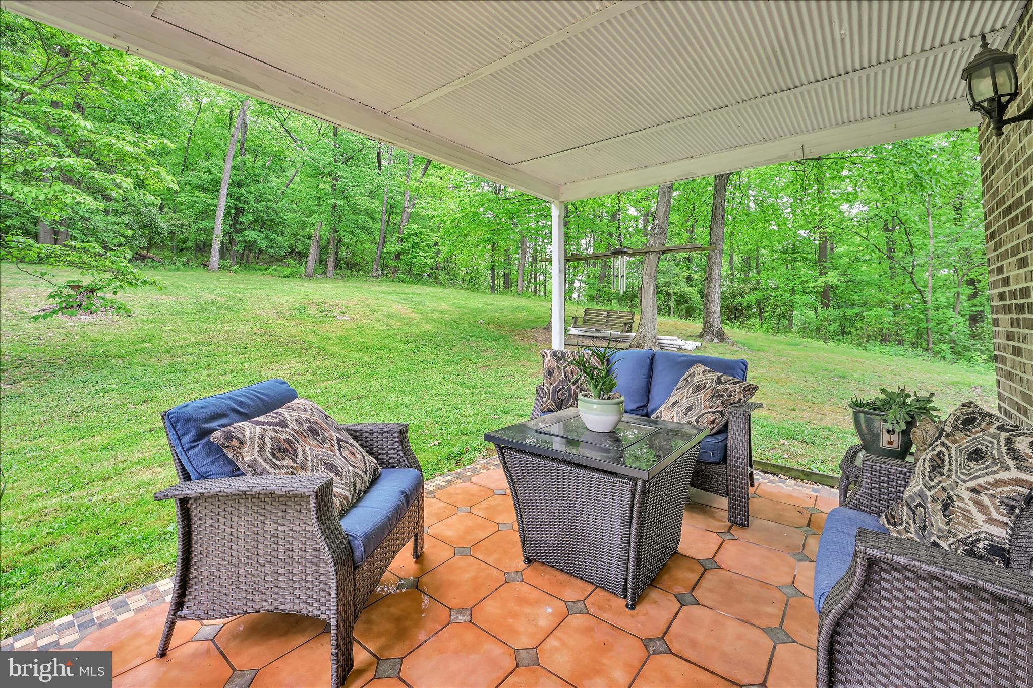 5220 Oley Turnpike Road Reading, PA 19606 - Photo 31 of 85 a view of a patio with couches chairs and a yard