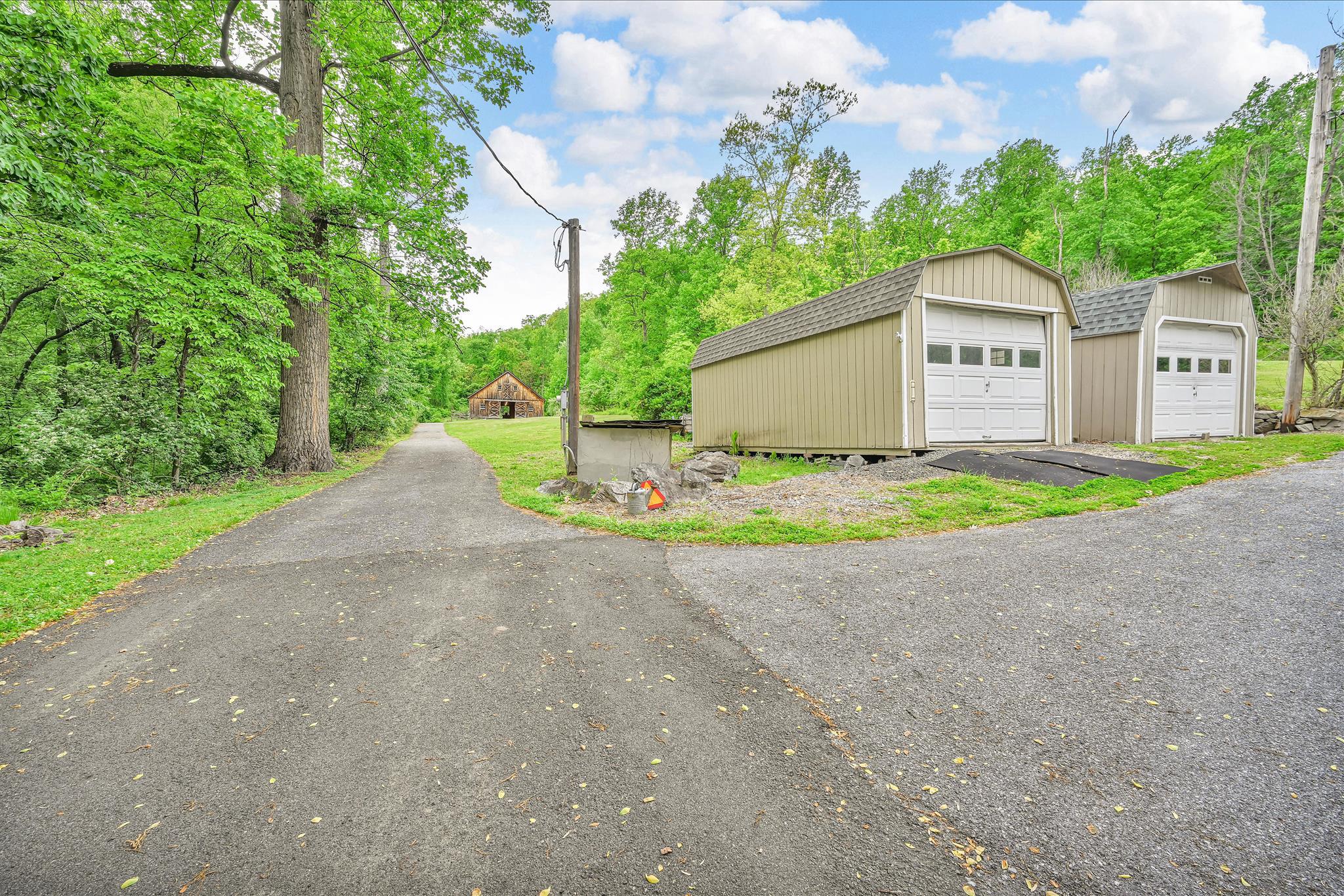 5220 Oley Turnpike Road Reading, PA 19606 - Photo 68 of 85 a view of a house with a yard and large tree