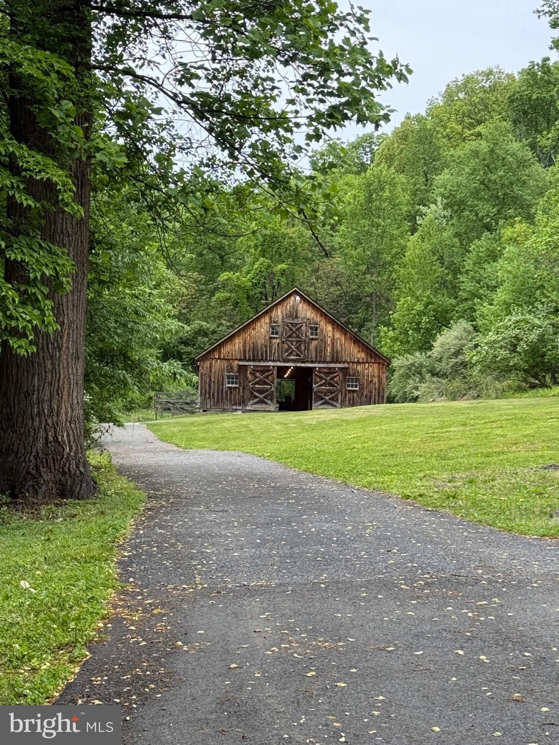 5220 Oley Turnpike Road Reading, PA 19606 - Photo 72 of 85 Charming barn nestled in lush greenery.
