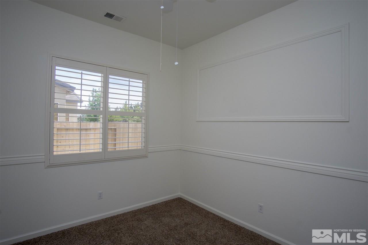 10598 Eagle Falls Way Reno, NV 89521 - Photo 10 of 17 an empty room with a window