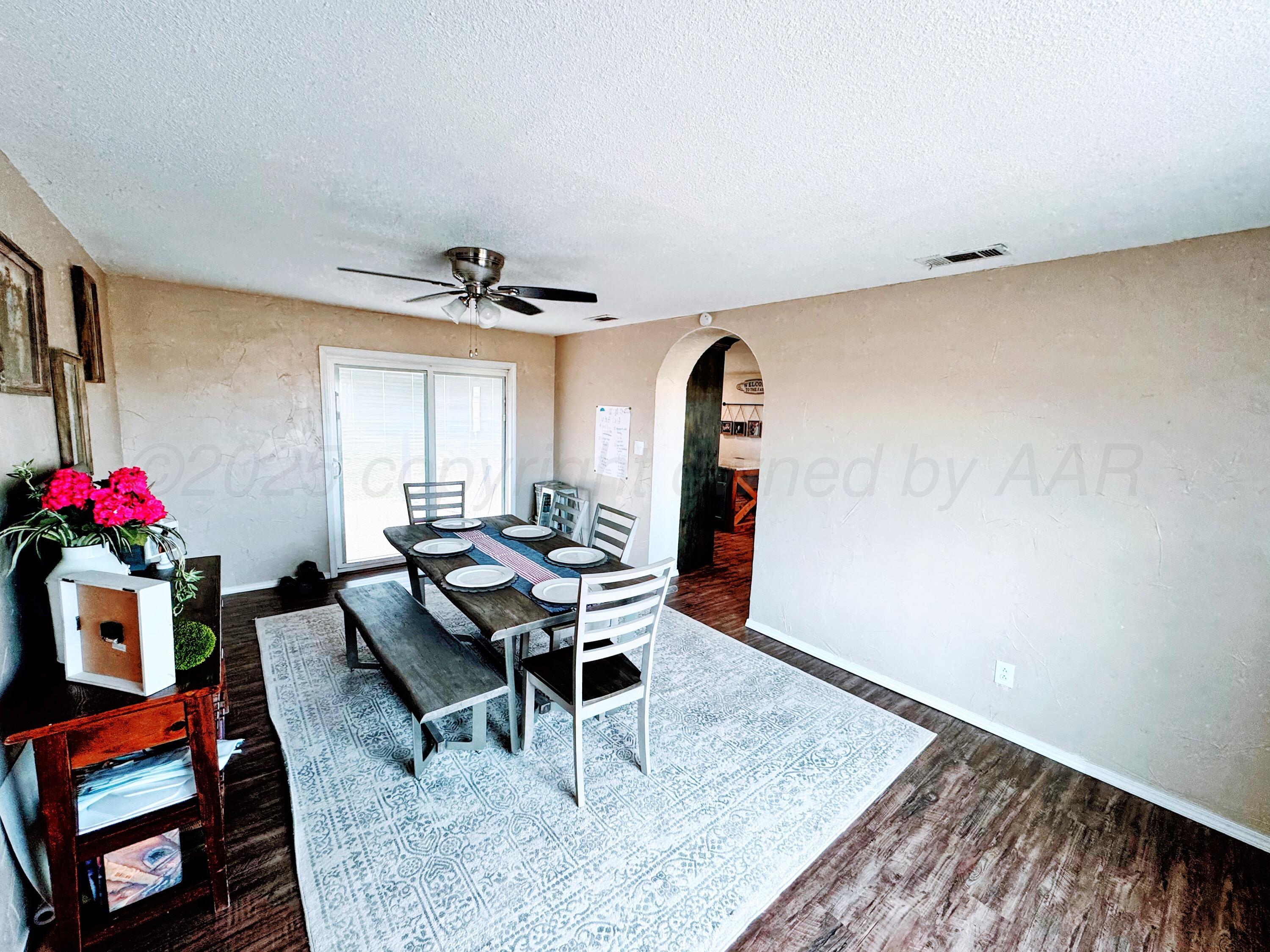 14155 County Road 7 Perryton, TX 79070 - Photo 11 of 25 a living room with furniture and a window