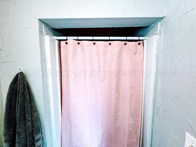 a view of a backyard of a house