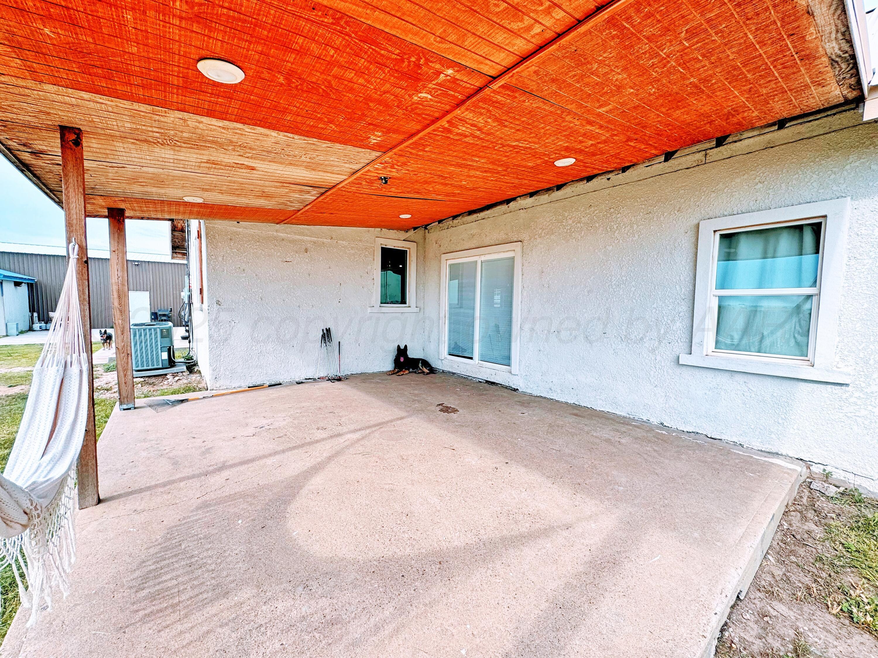 14155 County Road 7 Perryton, TX 79070 - Photo 19 of 25 a view of a backyard of a house