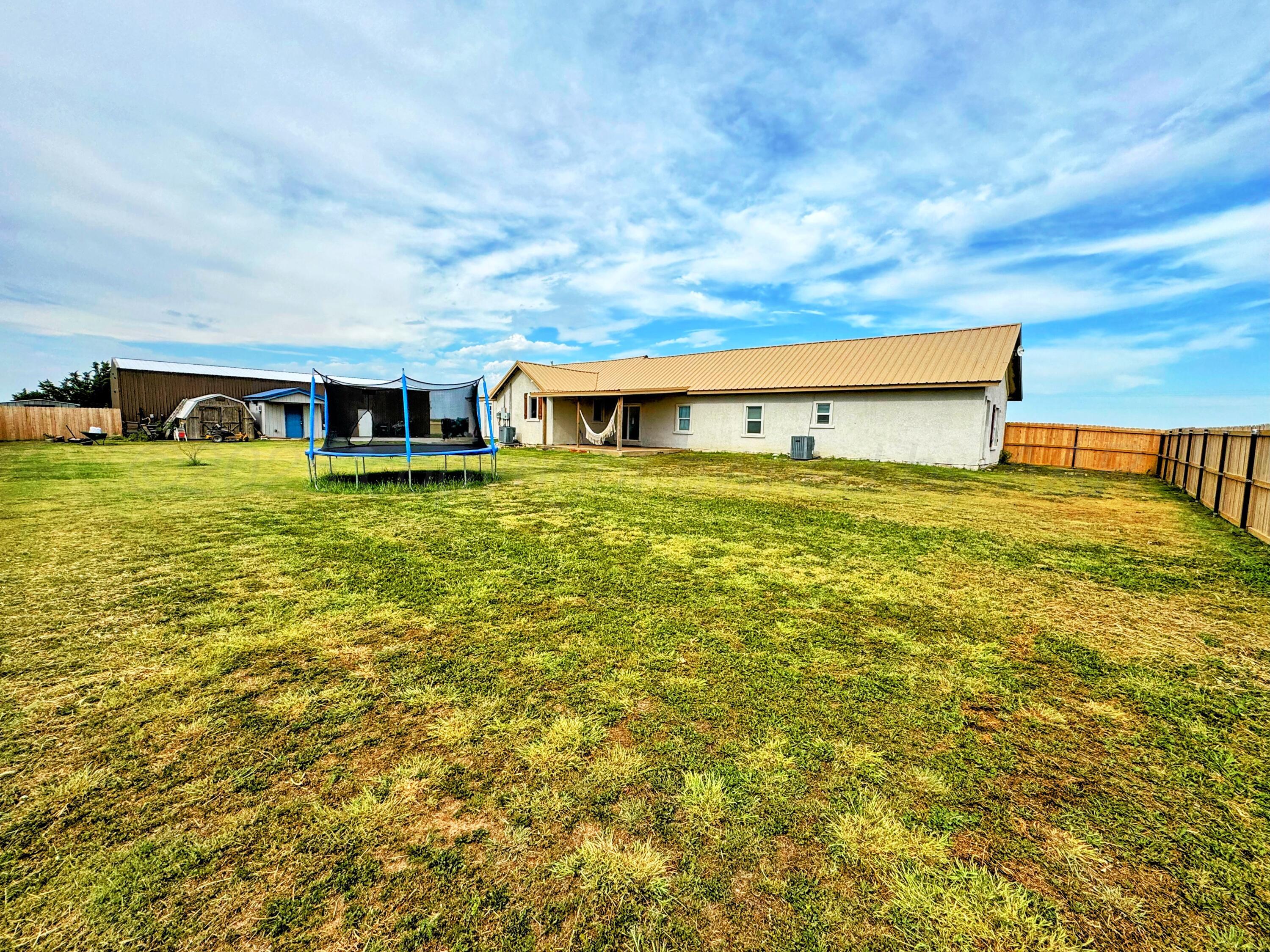 14155 County Road 7 Perryton, TX 79070 - Photo 20 of 25 a big room with an ocean view