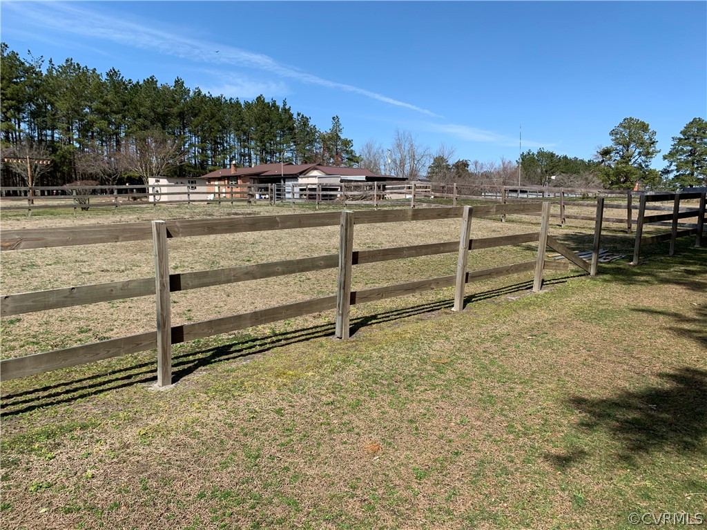 1079 CCC Road Crewe, VA 23930 - Photo 14 of 33 a view of a yard with wooden fence