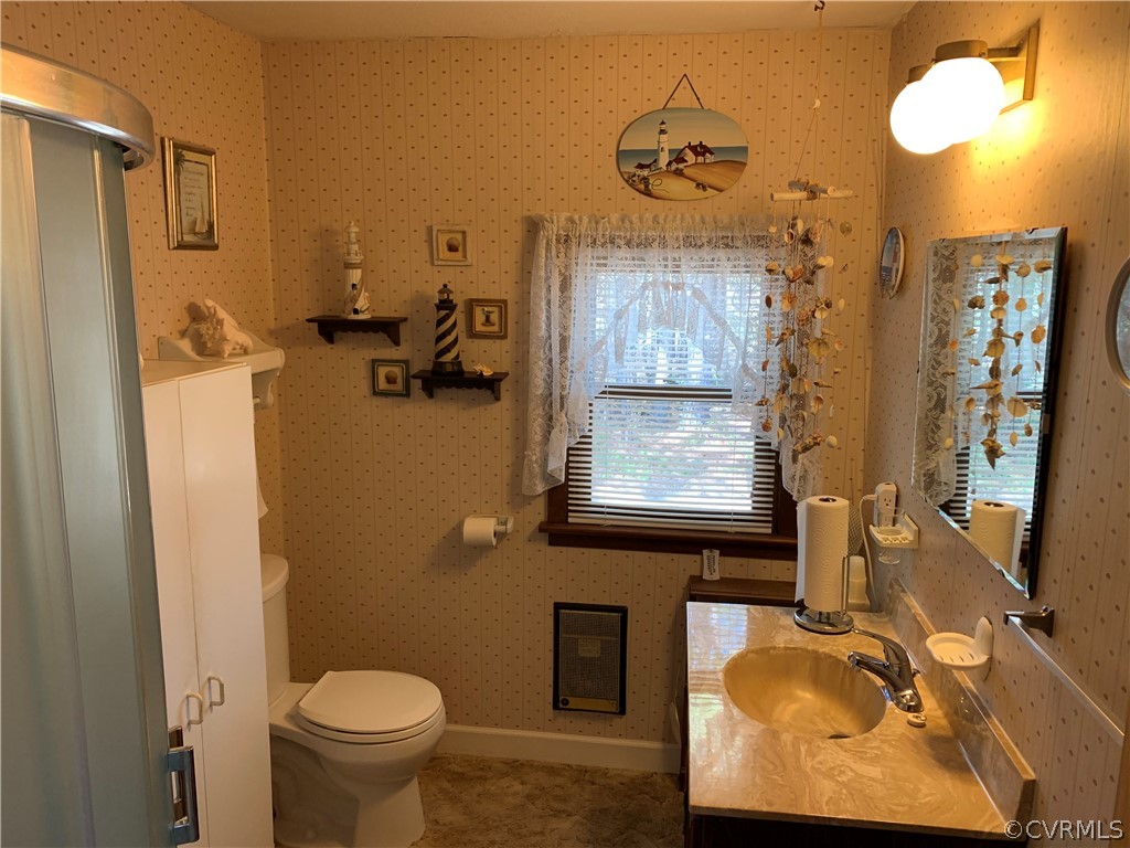 1079 CCC Road Crewe, VA 23930 - Photo 21 of 33 a bathroom with a granite countertop sink toilet and shower