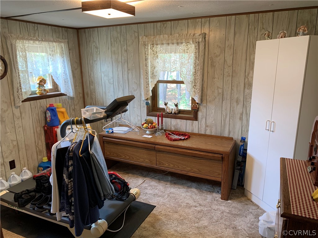 1079 CCC Road Crewe, VA 23930 - Photo 22 of 33 a room with gym equipment and a large window