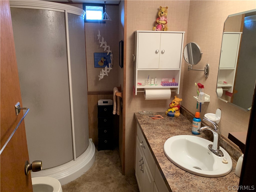 1079 CCC Road Crewe, VA 23930 - Photo 23 of 33 a bathroom with a sink double vanity and a mirror