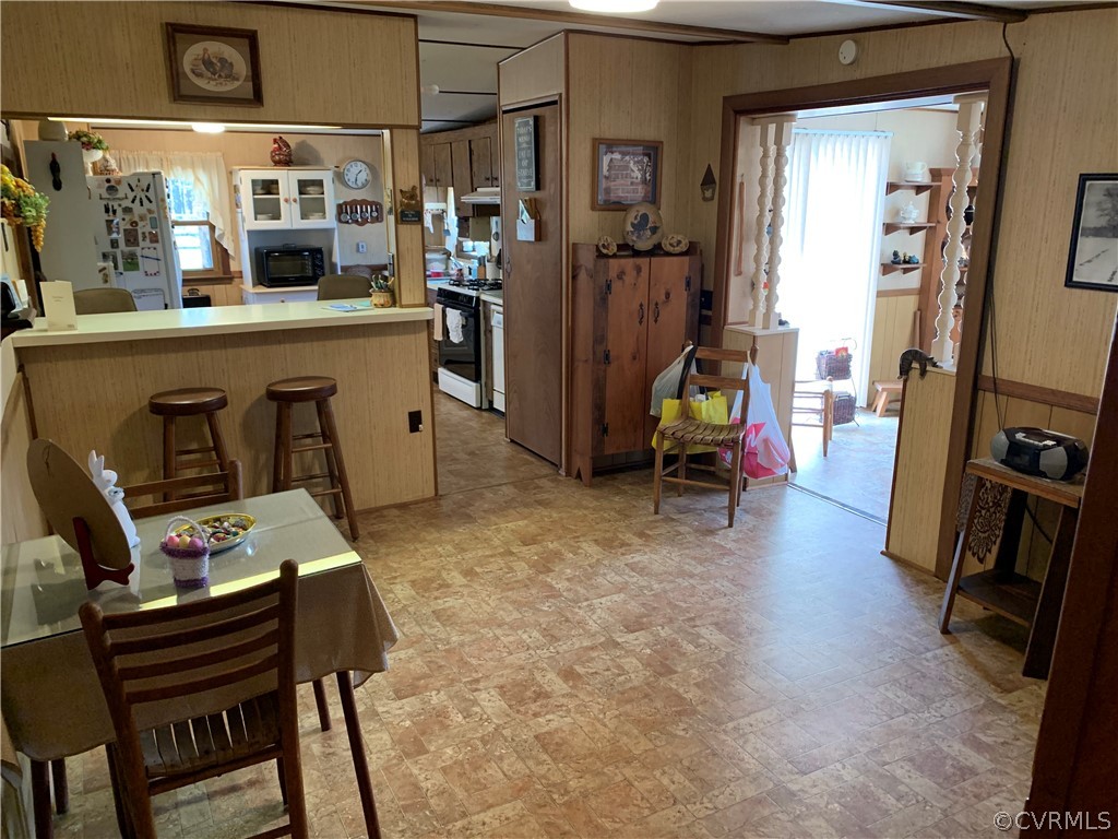 1079 CCC Road Crewe, VA 23930 - Photo 26 of 33 a room with furniture a air conditioner vent and a window