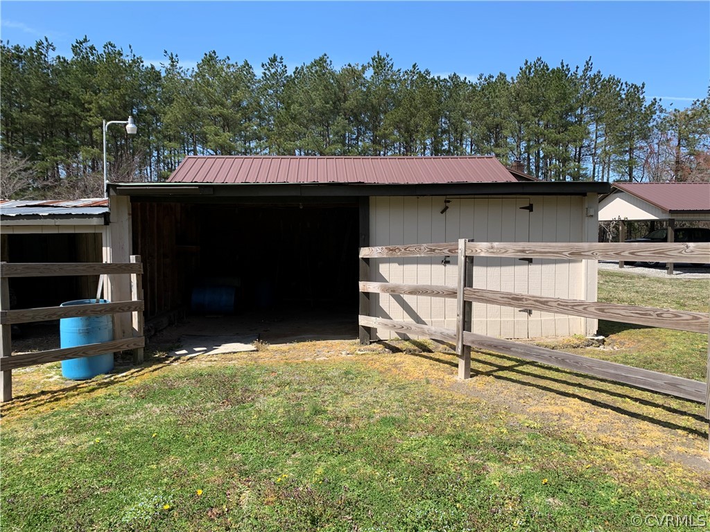 1079 CCC Road Crewe, VA 23930 - Photo 10 of 33 an outdoor view of a house with a yard