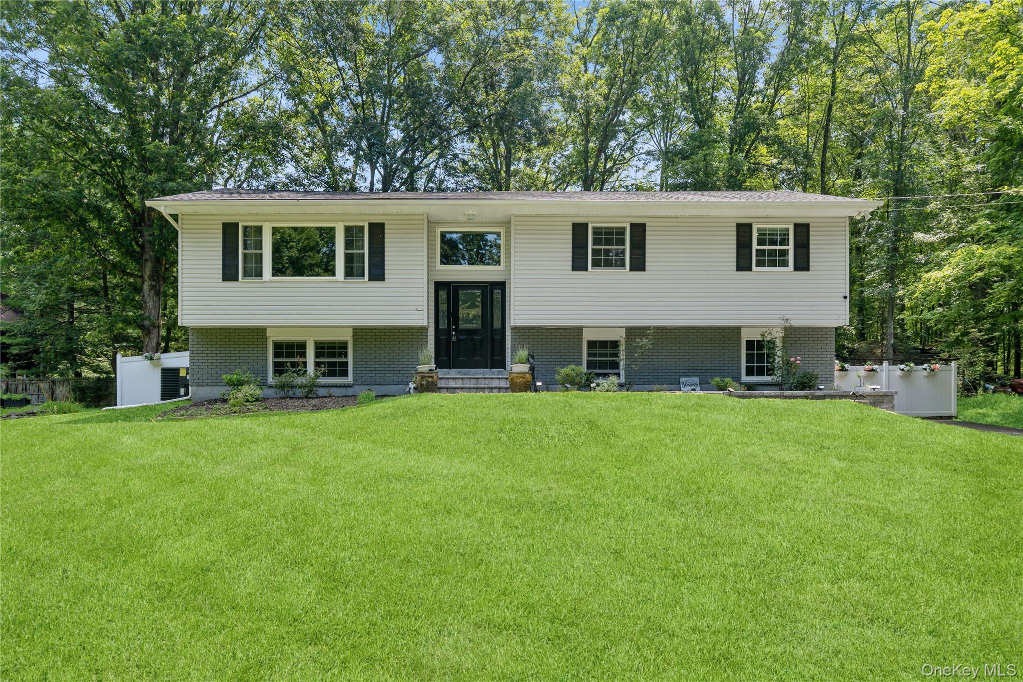 42 Alexander Road Monroe, NY 10950 - Photo 1 of 1 a house view with a garden space