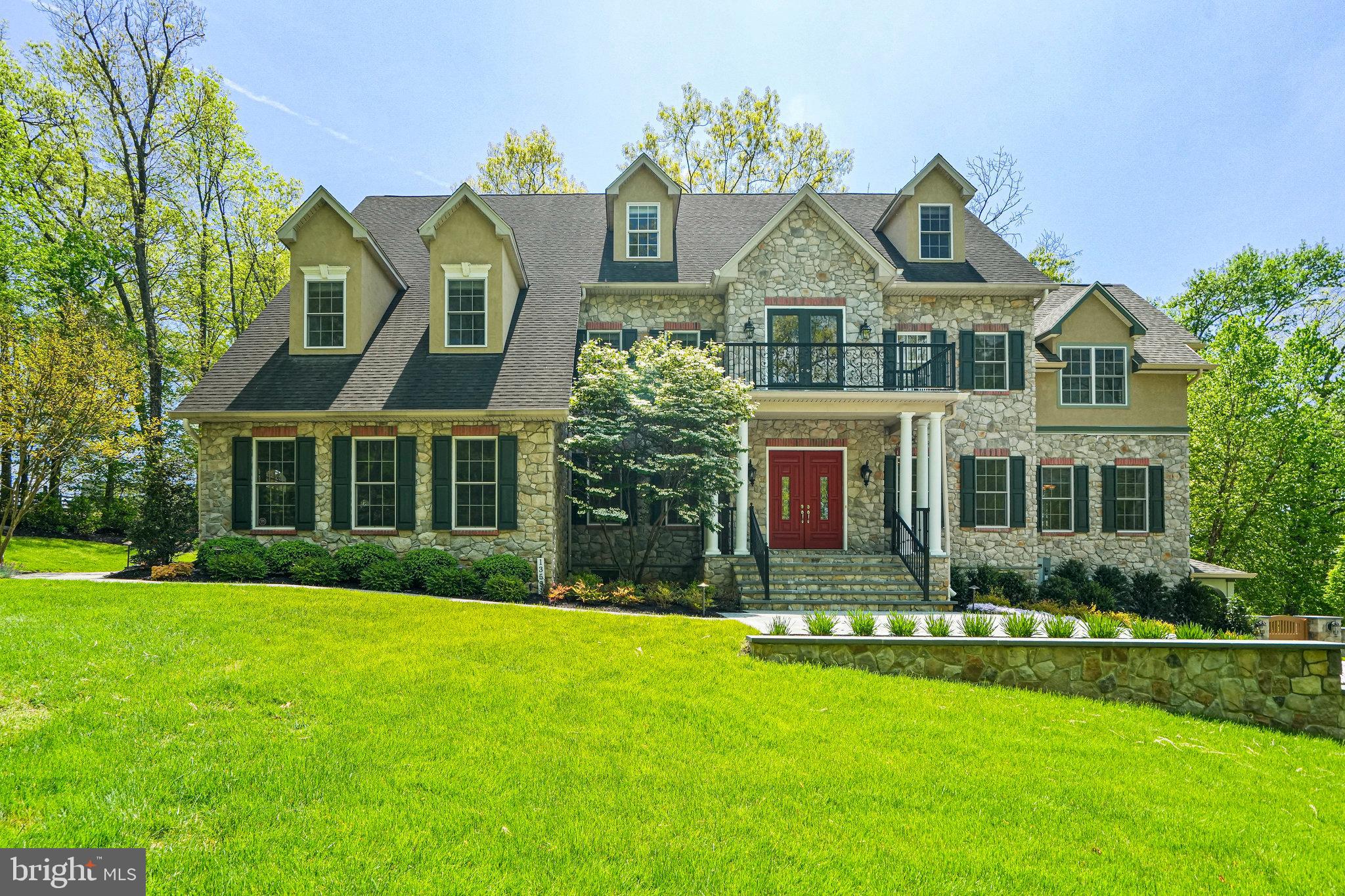 13551 Triadelphia Mill Road Clarksville, MD 21029 - Photo 2 of 74 a front view of a house with a yard