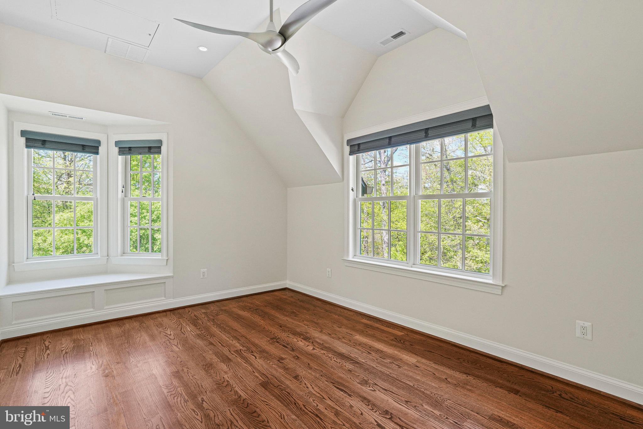 13551 Triadelphia Mill Road Clarksville, MD 21029 - Photo 36 of 74 a view of an empty room with wooden floor and a window