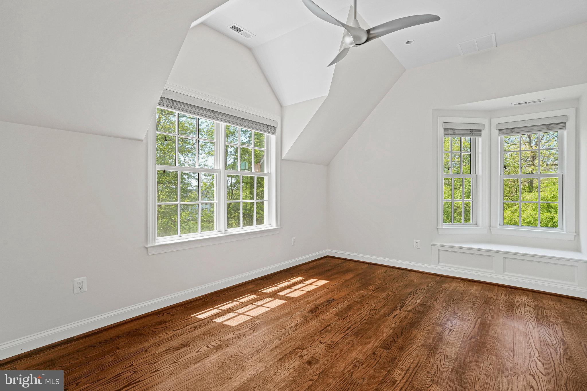 13551 Triadelphia Mill Road Clarksville, MD 21029 - Photo 39 of 74 an empty room with wooden floor and windows
