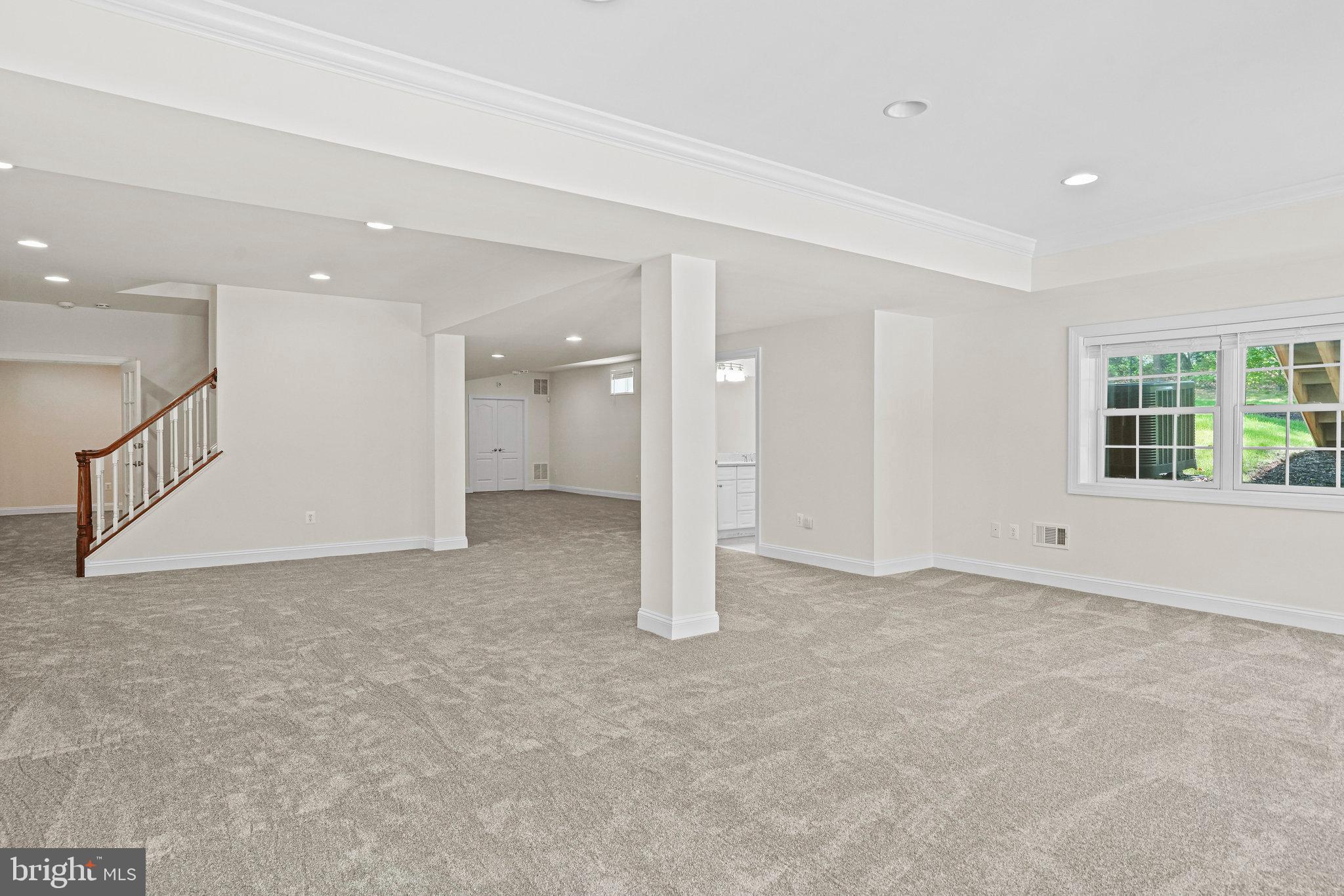 13551 Triadelphia Mill Road Clarksville, MD 21029 - Photo 58 of 74 an empty room with windows and pillars in it