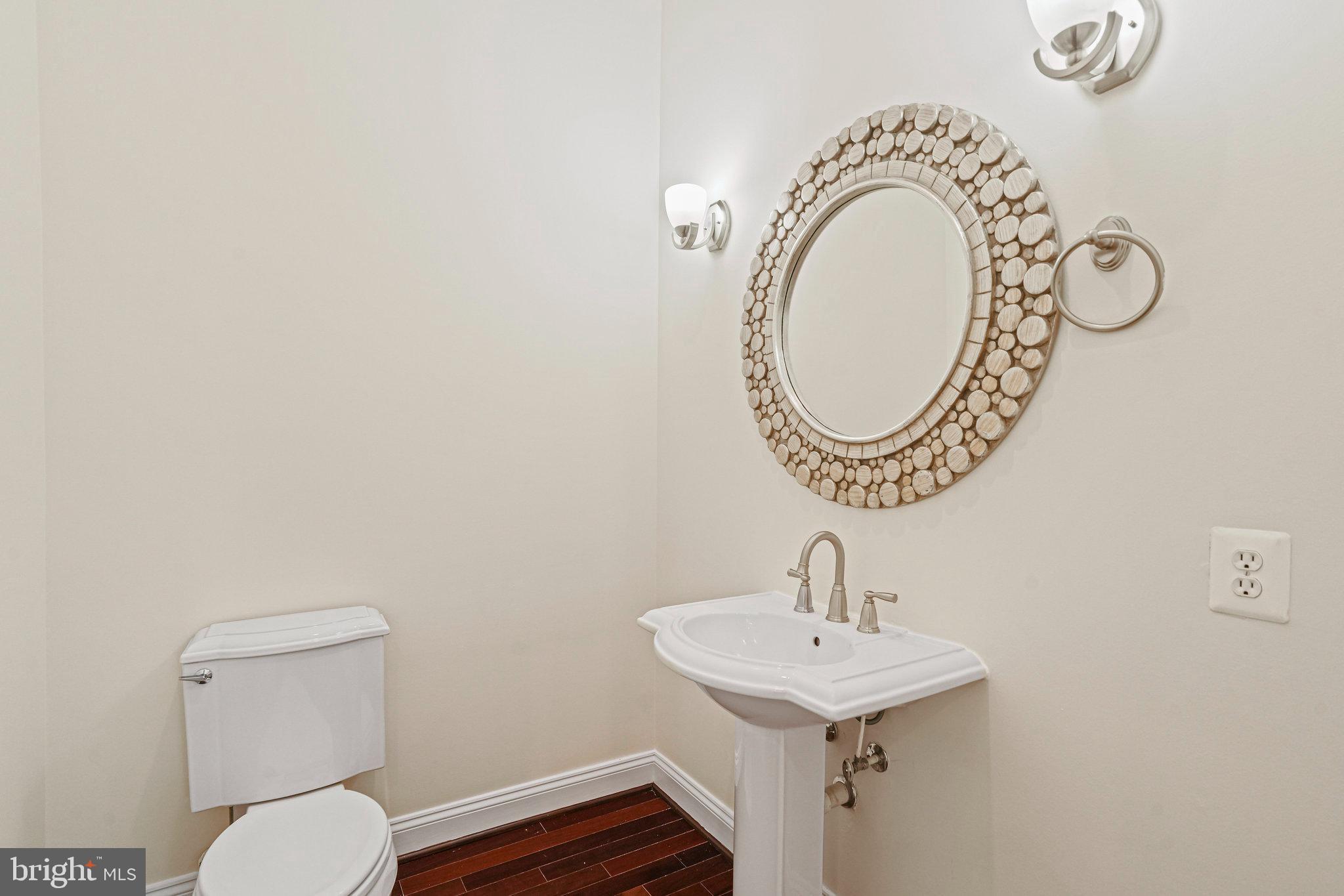 13551 Triadelphia Mill Road Clarksville, MD 21029 - Photo 8 of 74 a bathroom with a toilet and a sink