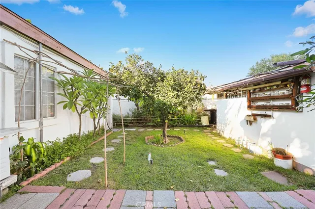 view of a house with a yard