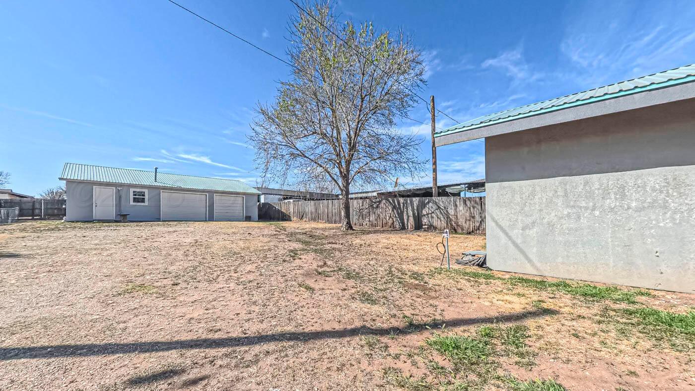 1316 Withers Avenue Amarillo, TX 79108 - Photo 3 of 19 a view of a backyard of the house