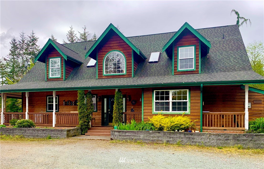 14201 Reiner Road Monroe, WA 98272 - Photo 1 of 1 a front view of a house with garden